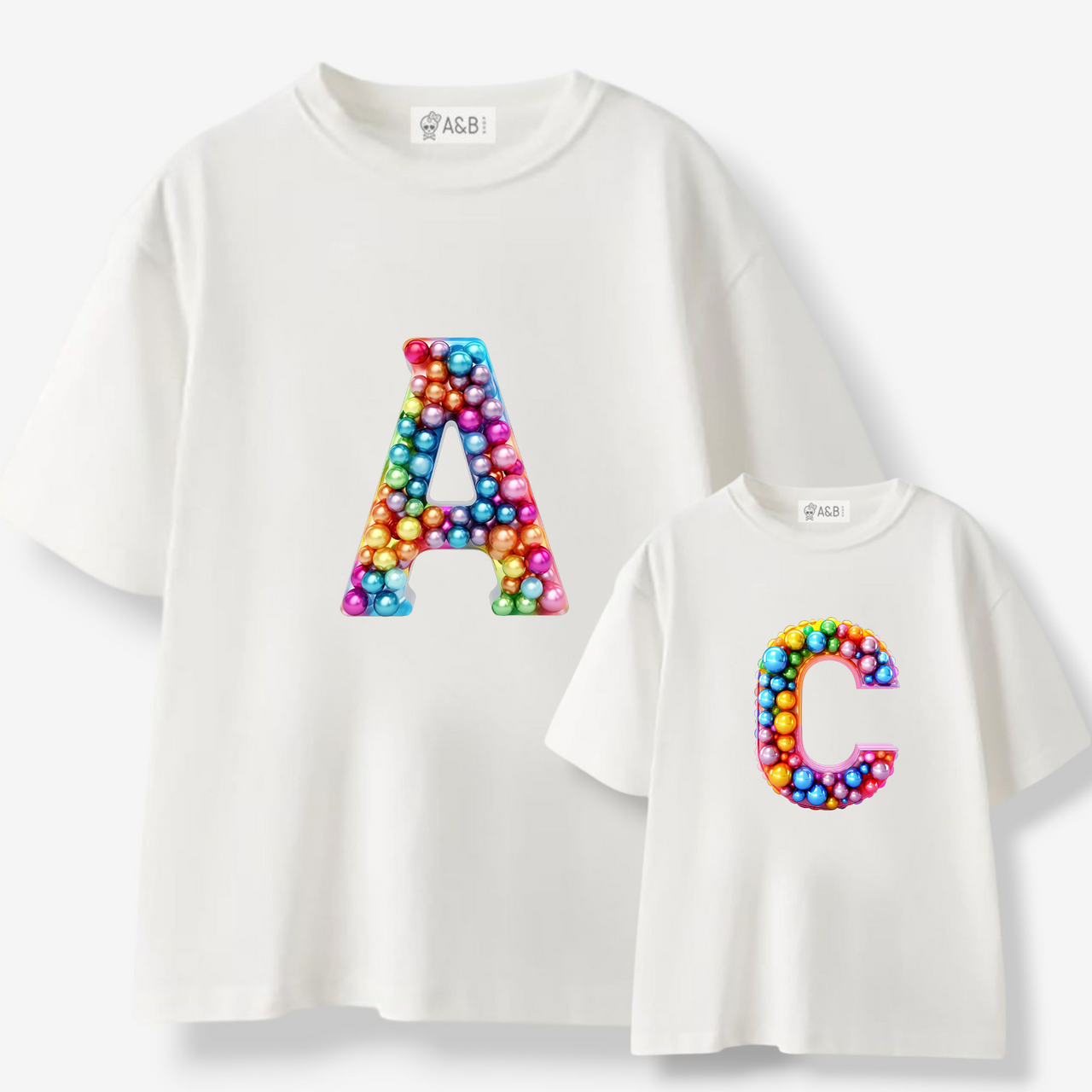 Camiseta Personalizada Inicial Burbujas